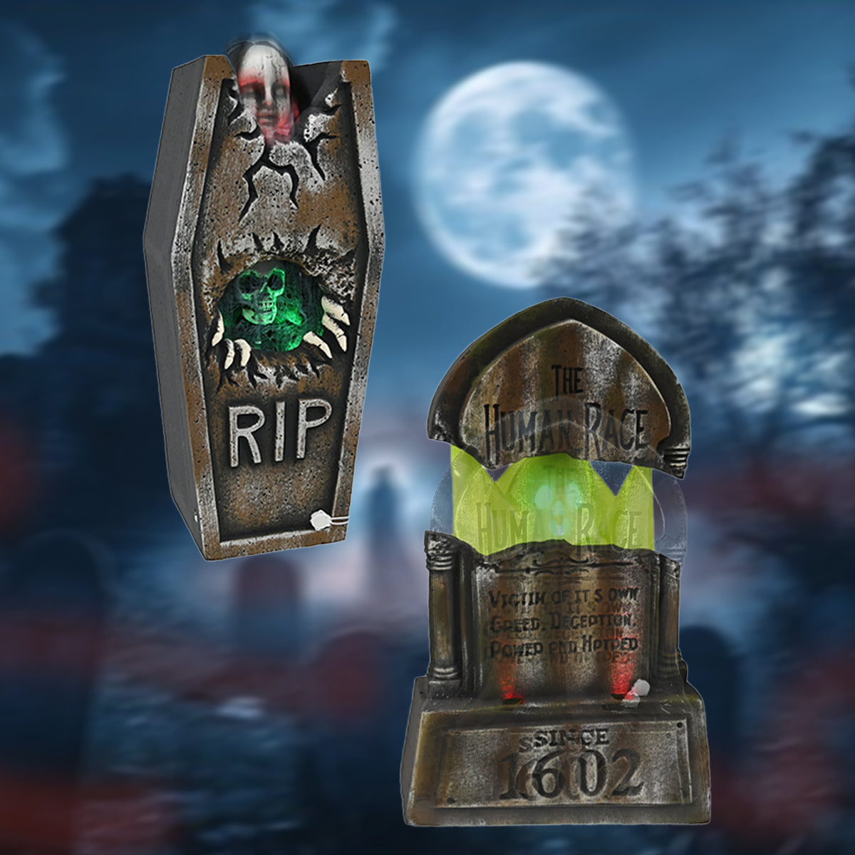 Two Halloween tombstone decorations shown against a spooky night-sky background with a full moon. One is a coffin-shaped RIP sign with a green skull and white fangs, and the other is a larger gravestone reading 'The Human Race' with a glowing green grave and red candles.