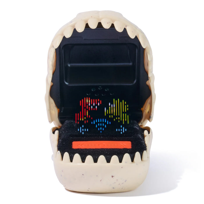 A novelty skull-shaped container or display with an open mouth, featuring a black interior and colorful LED-like graphics inside, photographed on a clean white background.