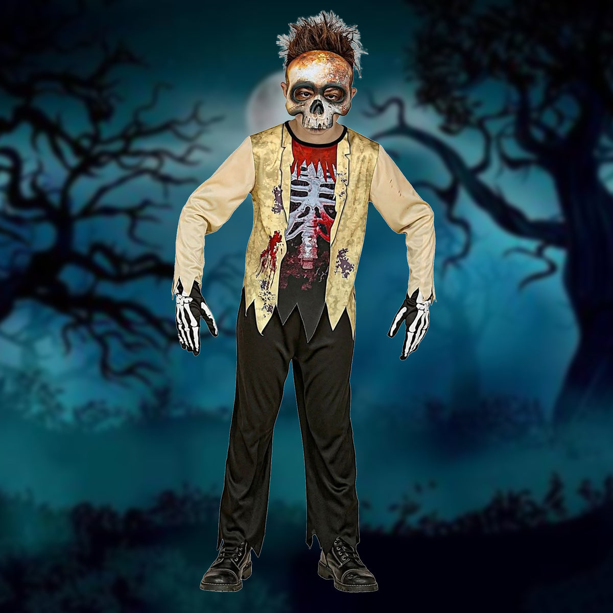 A child modeling a zombie Halloween costume against a spooky night forest backdrop. The costume includes a beige long-sleeve shirt, a gold vest, a red and black graphic T-shirt, black pants, and black shoes.