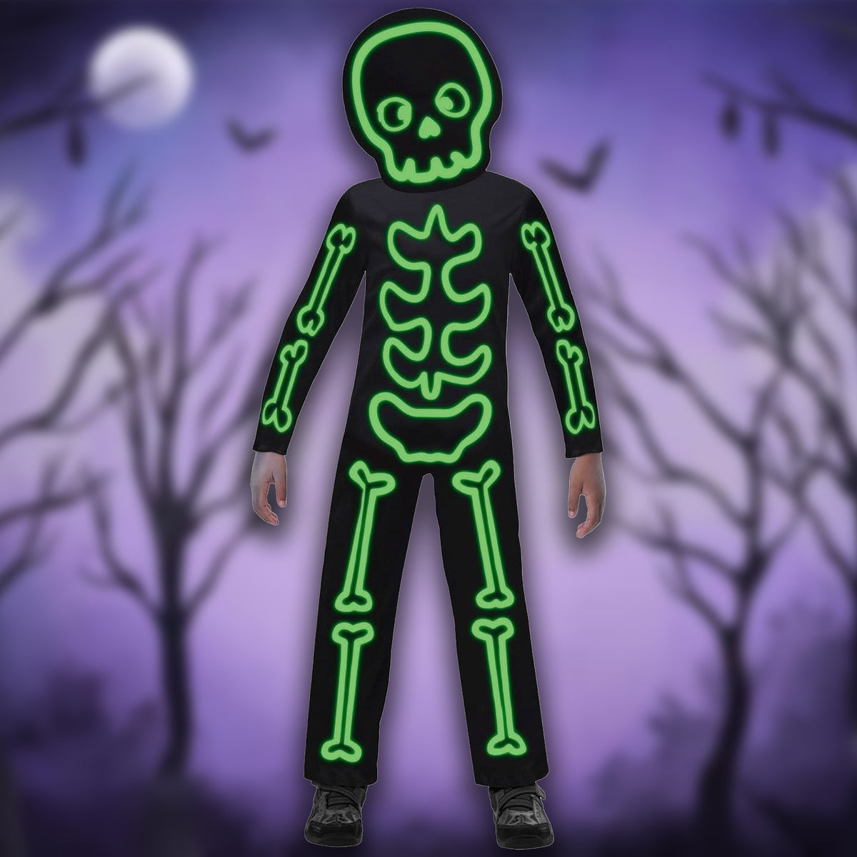 A child wearing a black skeleton costume with glowing neon green bone outlines, including a skull-shaped hood, shown against a spooky purple background with bare trees and a full moon.