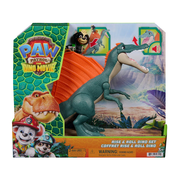 PAW Patrol The Dino Movie Rise and Roll Dino Set toy package, featuring a green dinosaur figure with an orange tail, displayed in its retail box with character graphics and product instructions.